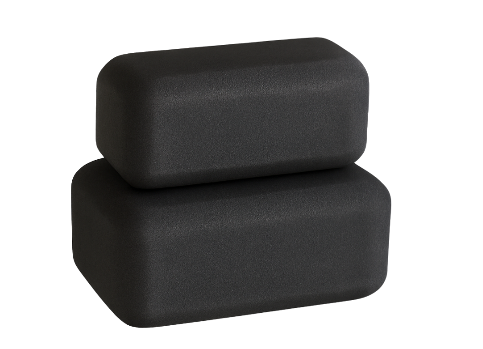 Two black physical therapy (un)Blocks stacked on a white background