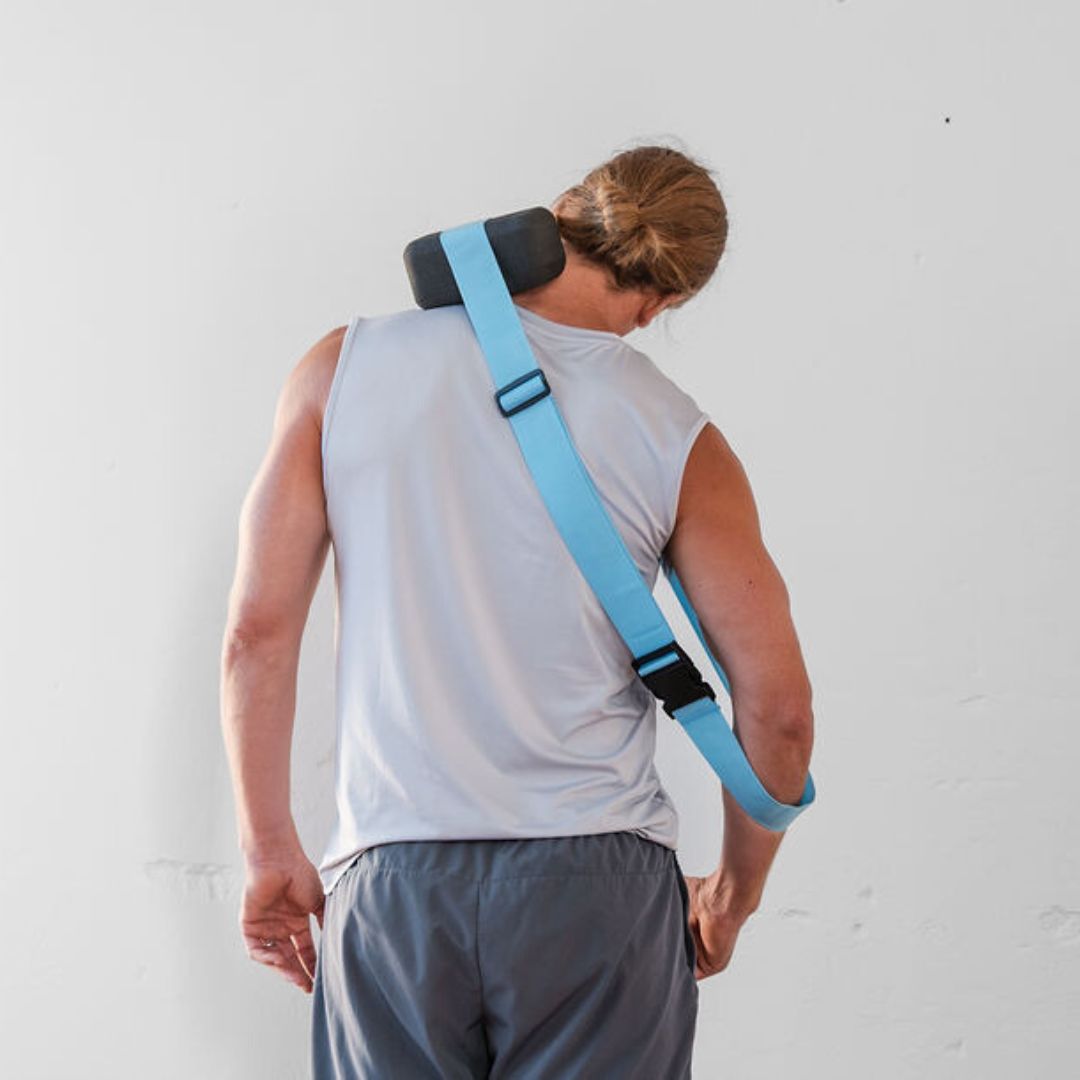 upper shoulder and neck pain relief from combining a mini (un)Block foam block with a luggage strap